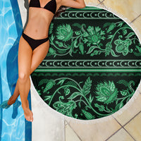 Green circular beach blanket with tassel fringe, decorative floral paisley ornament