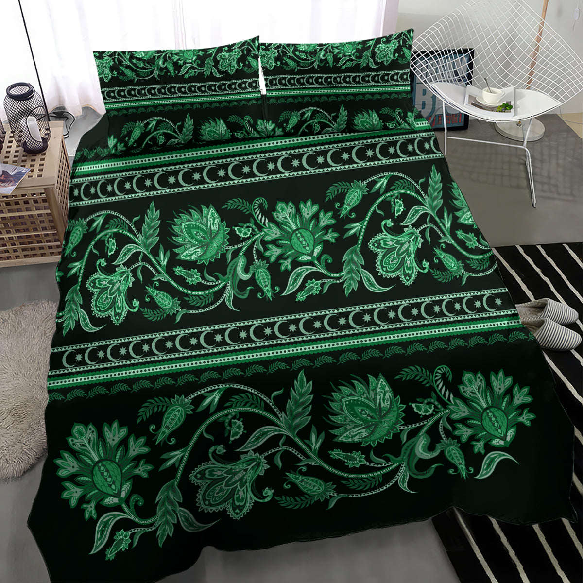 Green bedding set spread on bed, repeating leaf and buta floral ornament with border stripes