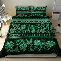 Green traditional bedding set with two pillow shams, floral scrolls and decorative band pattern