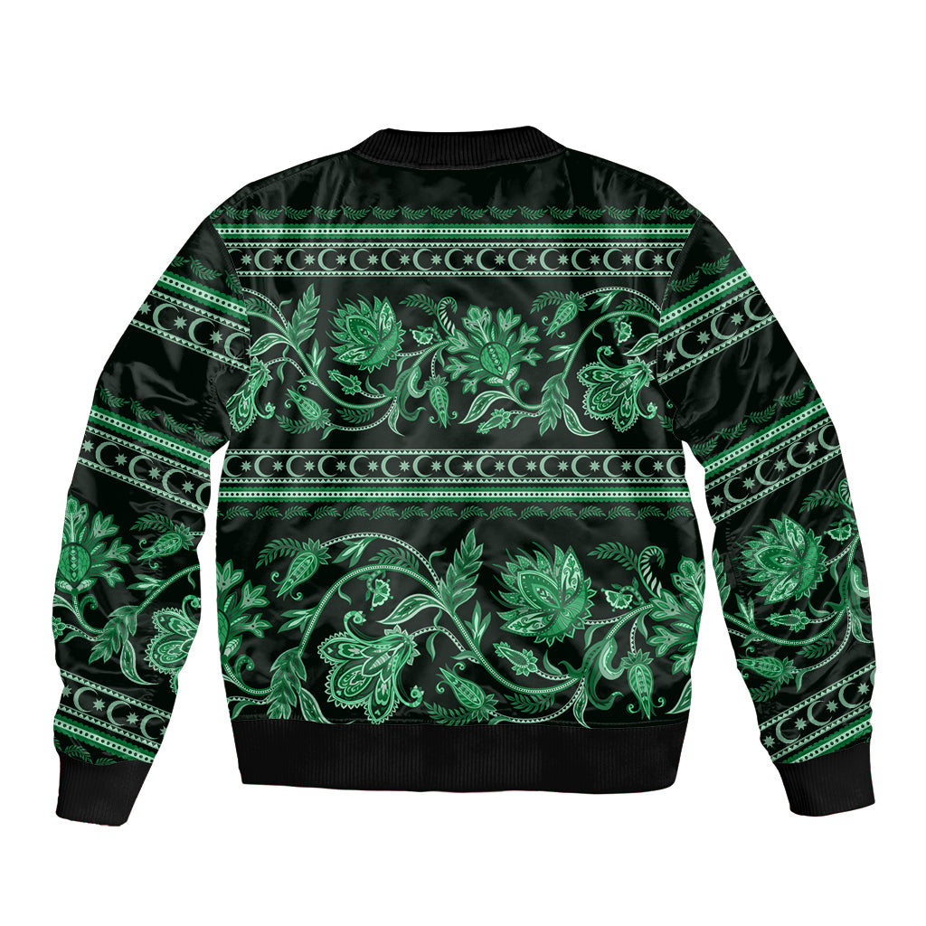 Unisex green bomber jacket with bold floral and scroll ornament, ribbed hem and cuffs