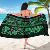 Green floral buta sarong on black base with wide horizontal border stripe