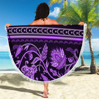 Violet round beach blanket with purple paisley floral pattern and white tassel fringe