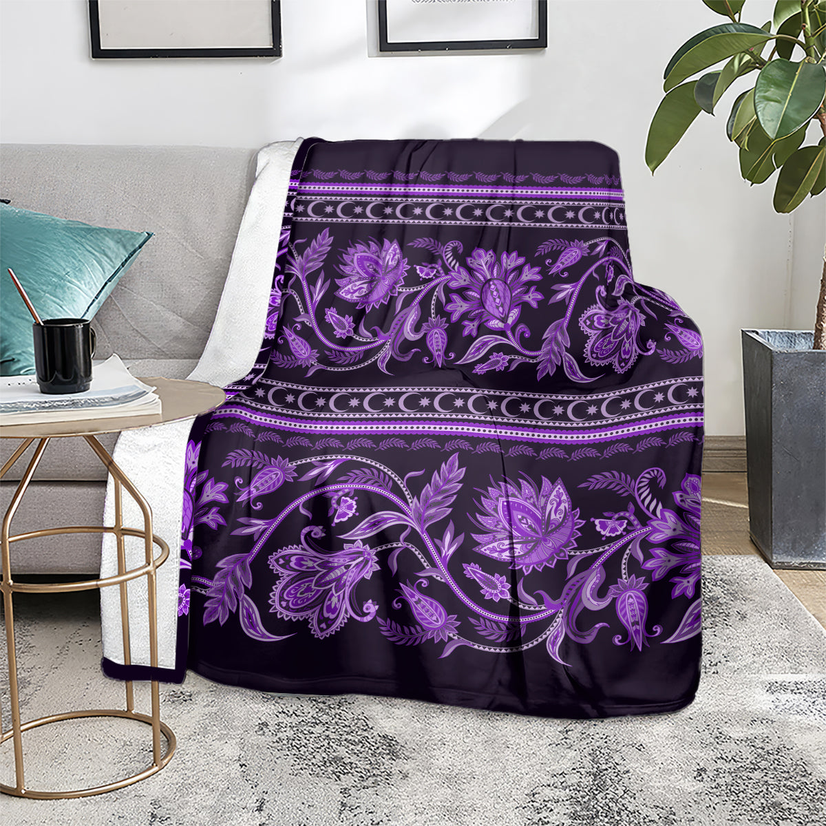 Violet throw blanket with purple floral motif, draped over couch seat