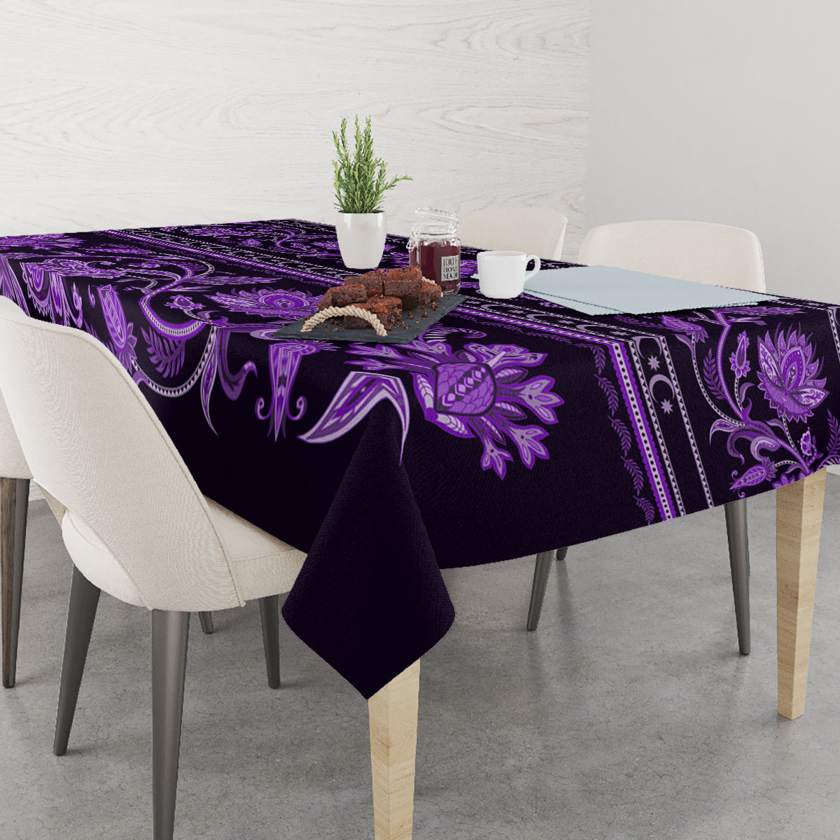 Violet tablecloth with large floral motifs and decorative border