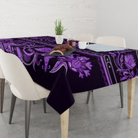 Violet tablecloth with large floral motifs and decorative border
