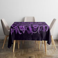 Violet round tablecloth with ornate floral band across top