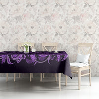 Violet tablecloth with floral ornament stripe along the edge