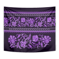 Violet floral scroll tapestry with repeating border trim on dark purple cloth