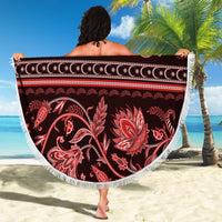 Round beach blanket with fringed edge, red paisley and leaf motifs, long stripe band