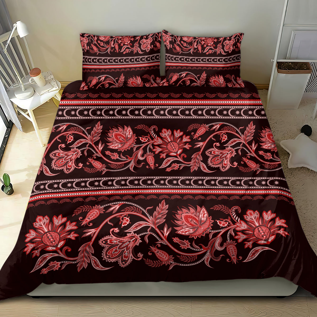 Red floral patterned bedding set with decorative border stripes and two pillowcases