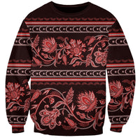 Burgundy crewneck sweatshirt with red floral buta ornament and patterned bands