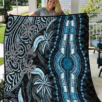 Black and blue dashiki-style quilt with large central teardrop motif and floral pattern