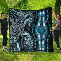 Black and blue dashiki quilt with tall vertical blue border and repeating ornamental motifs