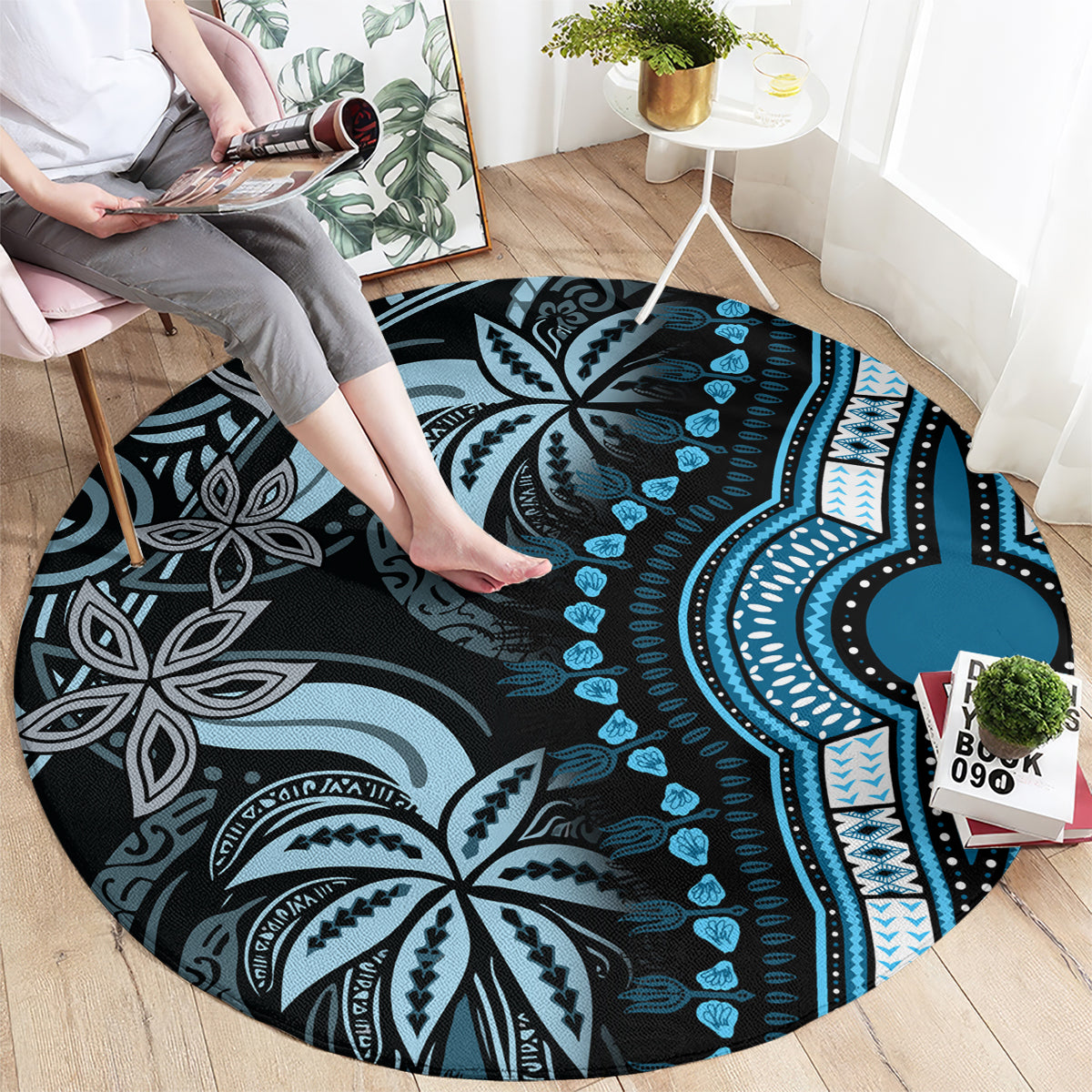 Round blue dashiki-style carpet with central mandala medallion and leaf motifs
