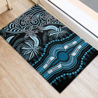 Blue rubber doormat featuring a teal-and-white dashiki ornamental motif with light blue trim