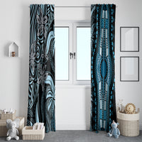 Blue and black tribal patterned window curtains hanging on a white doorway