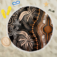Round beach blanket with fringed edge, black and white tribal design with orange accents