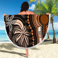 Round beach blanket with fringed edge, large circular tribal pattern in black, cream, orange