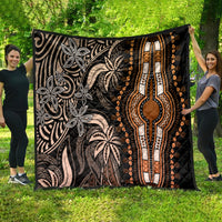 Dark dashiki quilt spread on grass, featuring gold center medallion and tribal border