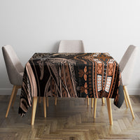Dark dashiki print tablecloth with gold, brown, and cream accents