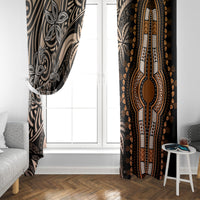 Gold and black patterned window curtain panels framing a white door window