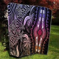 Dashiki-inspired quilt with central teardrop medallion in purple, pink, and orange