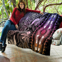 Dashiki-inspired quilt laid over furniture, black with purple/pink mandala design