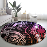 Round dashiki-style carpet with dark base and purple/pink mandala cross tribal motif