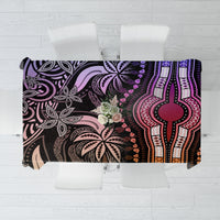 Patterned tablecloth with purple, pink, and black geometric motifs; rectangular drape.