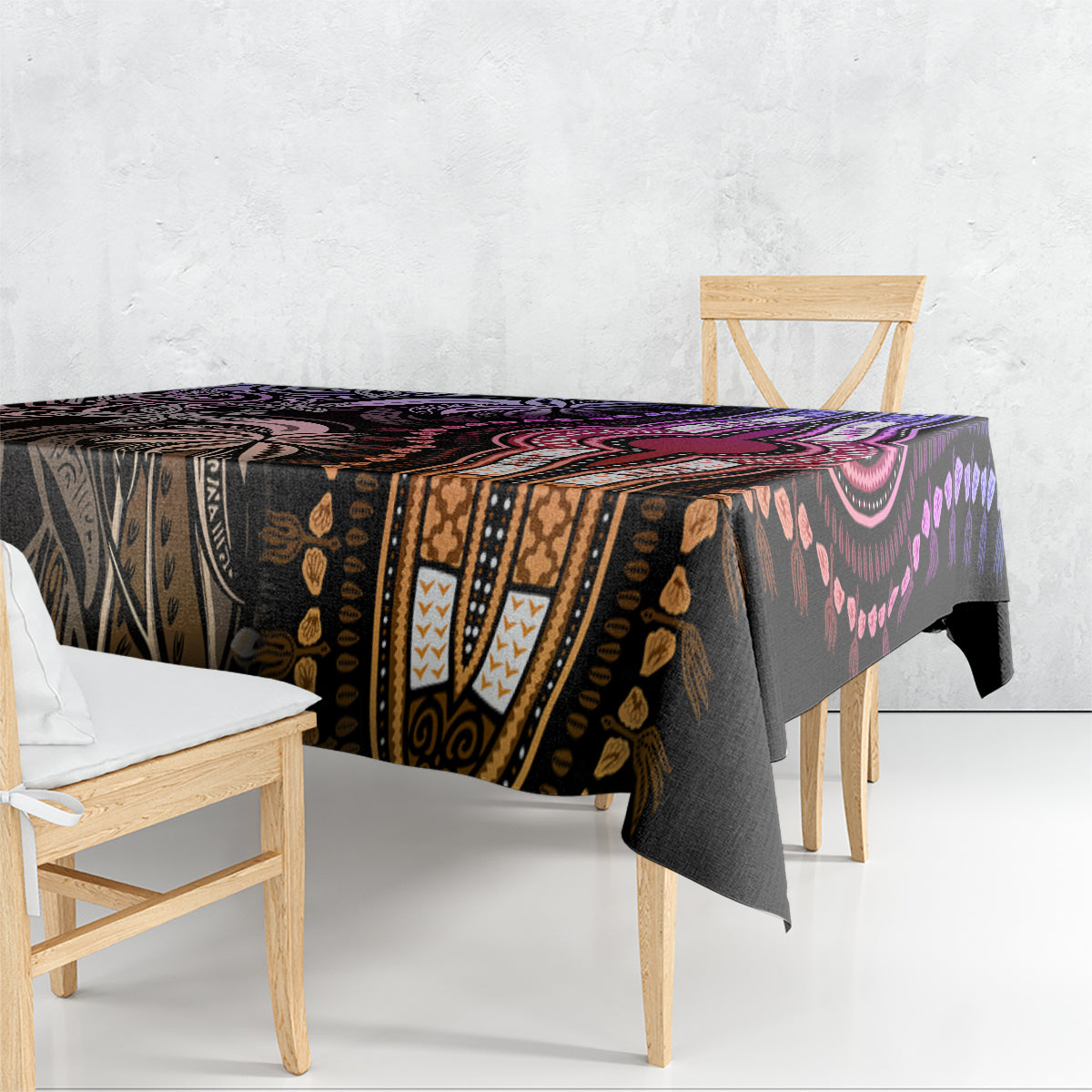 Patterned tablecloth draped over dining table edge, purple and black tribal design.