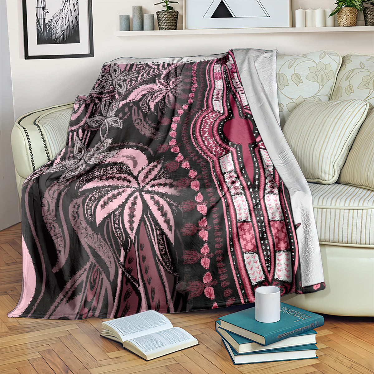 Pink and dark plum dashiki-style blanket draped over couch back with patterned stripe edge