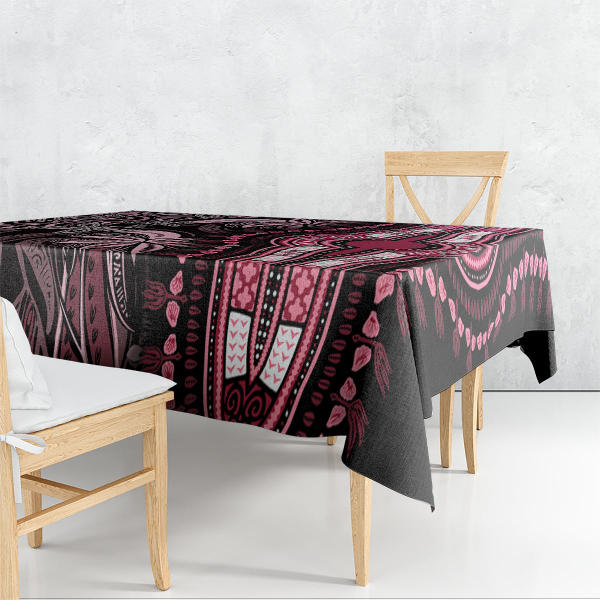 Rectangular tablecloth with dark, ornate pattern and pink tribal-style sections