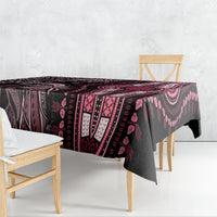 Rectangular tablecloth with dark, ornate pattern and pink tribal-style sections