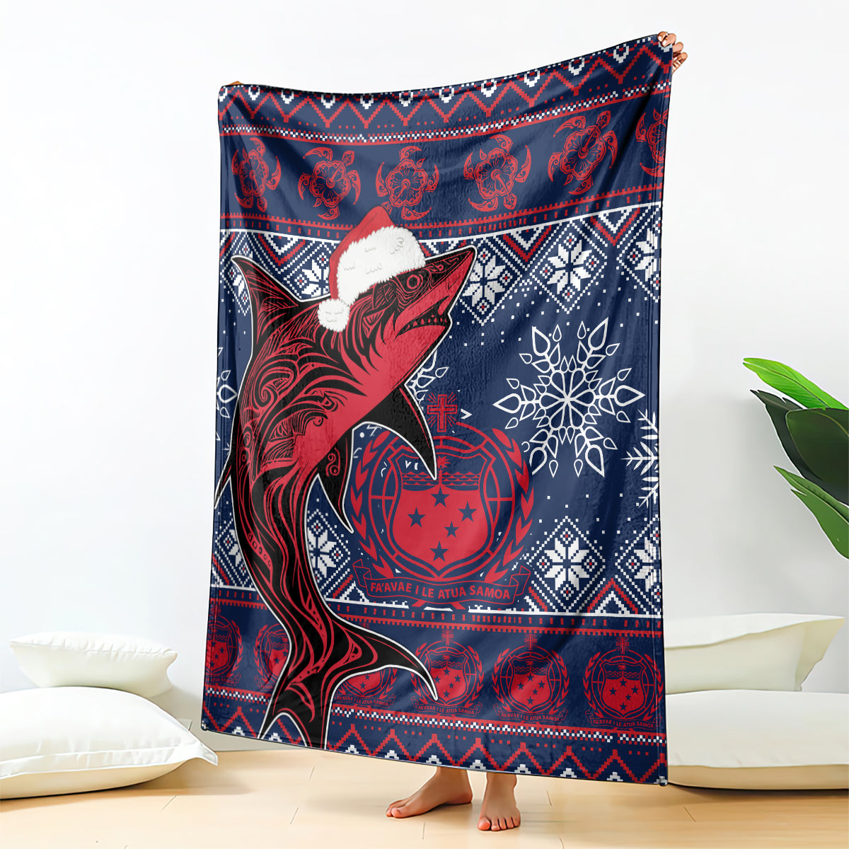 Red and navy tribal Christmas blanket with dolphin-and-Santa-hat motif and snowflake patterns