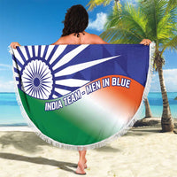 Round beach blanket with wheel flag print and white fringe, held outdoors