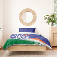 Blue flag-themed duvet with Ashoka chakra and custom text on bed with one pillow