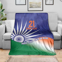 India cricket custom blanket on sofa, Ashoka Chakra rays with blue/green/orange gradient and 21 'YOUR TEXT'