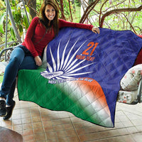 Blue quilt held over couch with India flag print, Ashoka Chakra, orange 21, custom text