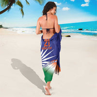 Blue/green sarong wrap tied back, with Ashoka Chakra and 21 center print
