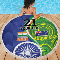 Round beach blanket with white fringe, India and Aussies themed circular graphic.