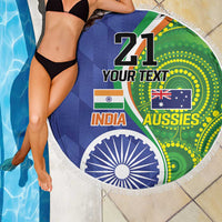 Round beach blanket with white fringe, blue-green India and Aussies flags design.