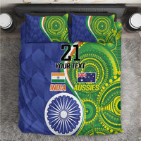 Blue and green cricket-themed bedding set with two pillows and large circular emblem design