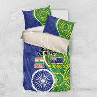 Blue and green bedding set with two pillows and duvet; circular emblem and flag design