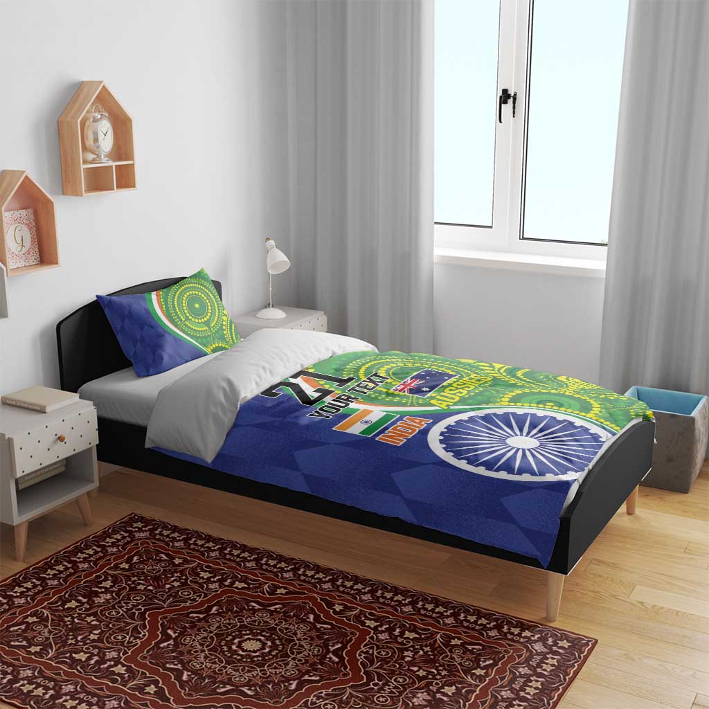 Blue and green duvet on bed with pillows featuring circular emblem, flag graphics, '21'