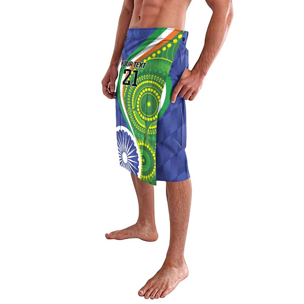 Blue-green printed knee-length shorts with elastic waistband, number 21 and flag-style bands
