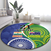 Round carpet with blue-green INDIA and AUSSIES graphic and '21 YOUR TEXT' title