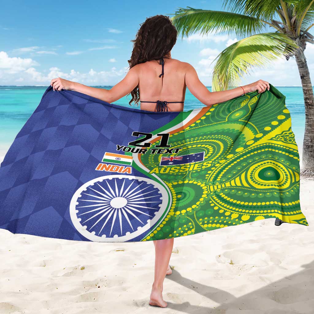 Custom cricket sarong, blue-green print with number 21, India-Aussies text and chakra