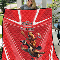 Red personalized Canada quilt with beaver and goose graphic, “YOUR TEXT”