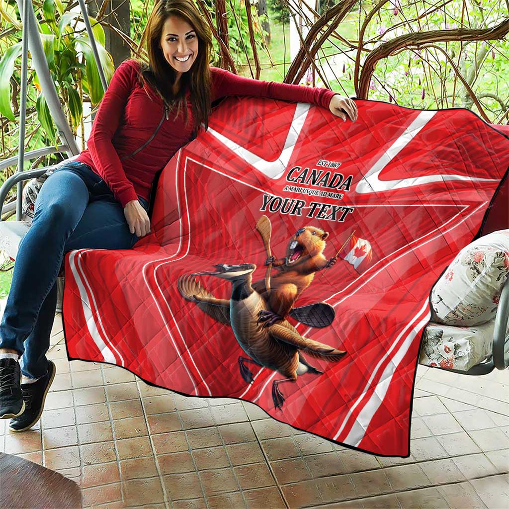 Red personalized Canada quilt draped outdoors with beaver and goose, “YOUR TEXT”