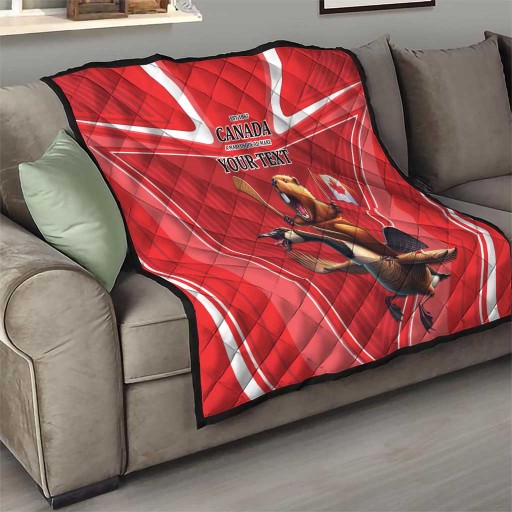 Red personalized Canada quilt with beaver and goose design and “YOUR TEXT” on sofa